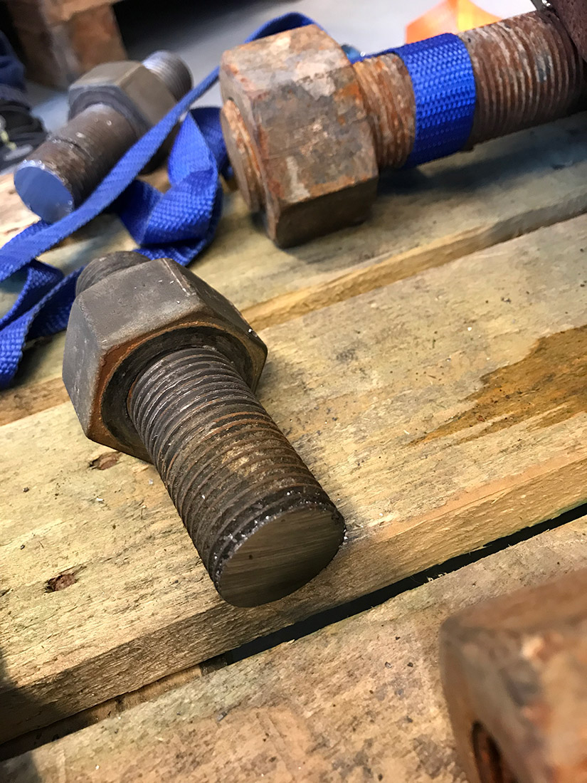 bolt that is cut in half with the normaco flange bolt cutting saw