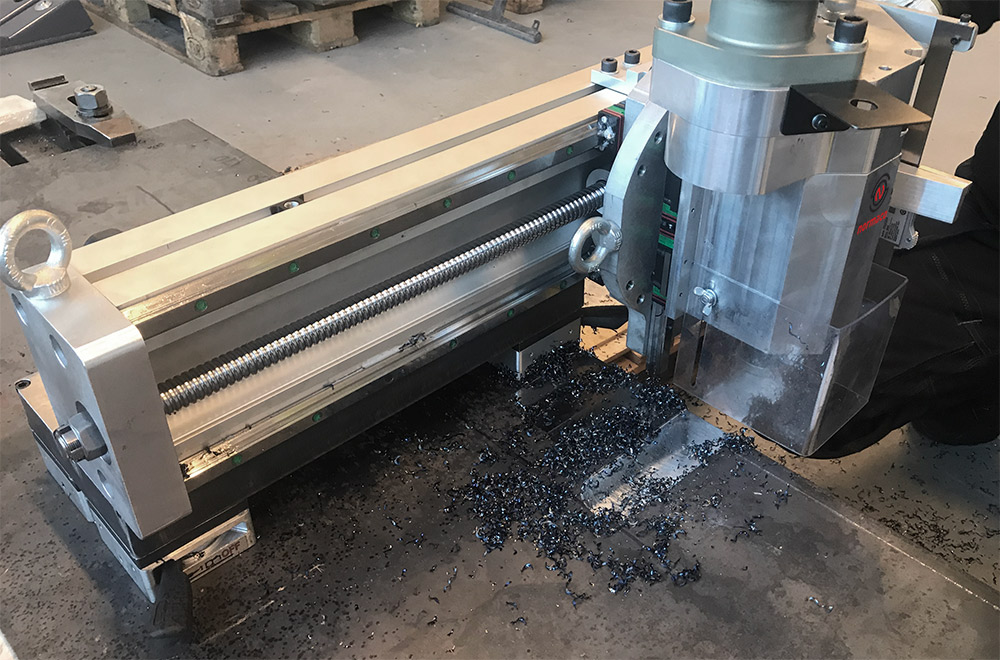 Normaco 2-axis pneumatic milling machine working onsite