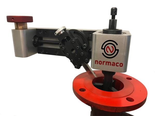 Normaco Manual Facer mounted on a red flange 